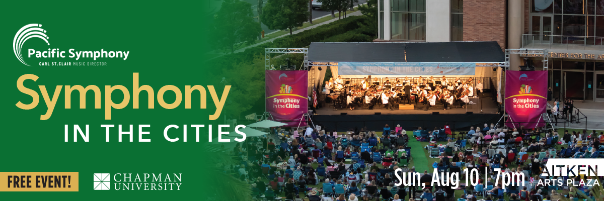image is a photograph of an outdoor symphony performance. Transcribed Text:  Pacific Symphony CARL ST.CLAIR MUSIC DIRECTOR Symphony In The Cities FREE EVENT! CHAPMAN UNIVERSITY Sun, Aug 10 | 7pm AITKEN ARTS PLAZA